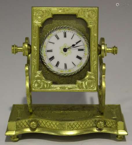 A late 19th/early 20th century gilt metal cased novelty boudoir timepiece, modelled in the form of a