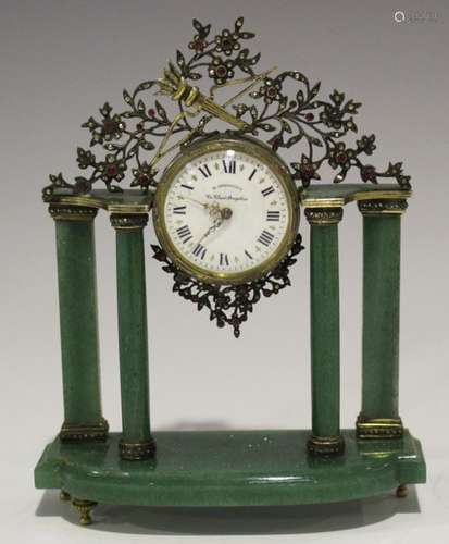 An early 20th century silver gilt mounted green aventurine portico boudoir timepiece with Swiss