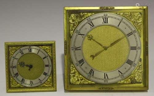 A 20th century gilt metal cased strut timepiece, the square dial with silvered chapter ring,