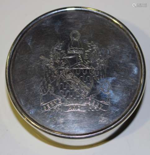 An Elizabeth II silver circular box and cover, engraved with the Worshipful Company of