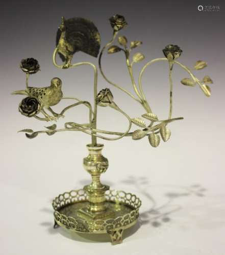 A white metal incense burner stand, probably Islamic, modelled in the form of sinuous rose stems