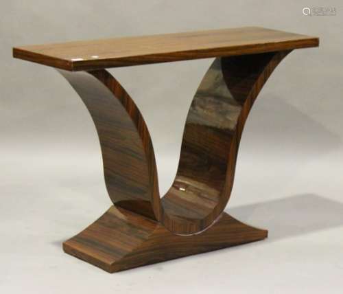 An Art Deco style walnut veneered console table of 'U' form, height 82cm, width 120cm, depth 40cm.