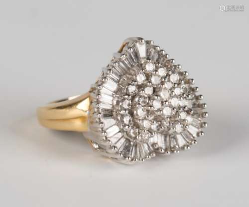 A 9ct gold and diamond cluster ring in a heart shaped design, the centre pavé set with circular