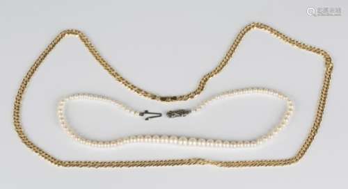 A 9ct gold faceted twin curblink neckchain on a sprung hook shaped clasp, length 70cm, and a