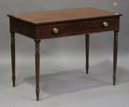 A Regency mahogany side table with ebony stringing, fitted with a single frieze drawer, raised on