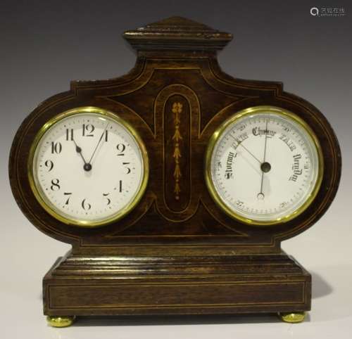 An Edwardian mahogany cased combination desk timepiece and barometer, each circular white enamel