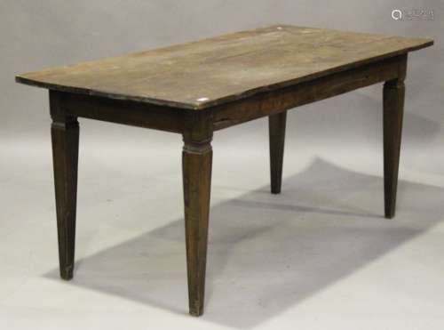An early 20th century French chestnut farmhouse kitchen table, the rectangular top raised on
