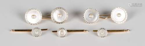 A gold, seed pearl and mother-of-pearl dress set, comprising a pair of cufflinks, the circular backs