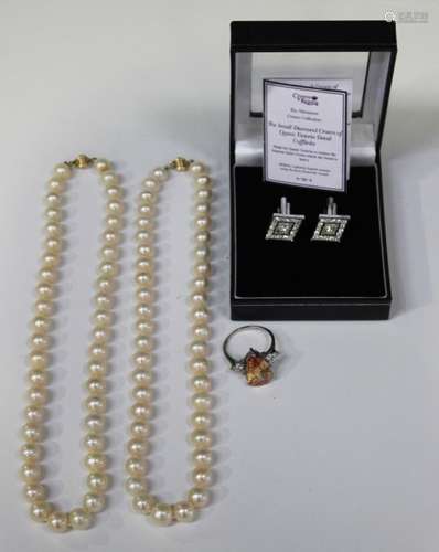 Two single row necklaces of cultured pearls on gold clasps, a pair of colourless paste set