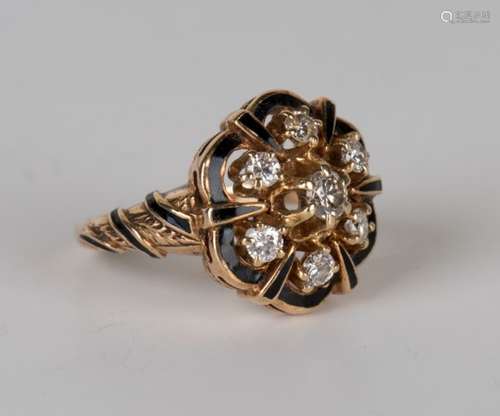 A gold, diamond and black enamel cluster ring, claw set with seven circular cut diamonds in an