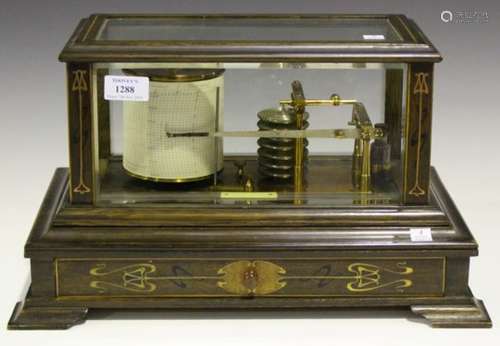 An Art Nouveau stained and inlaid oak barograph with lacquered brass mechanism and recording drum,