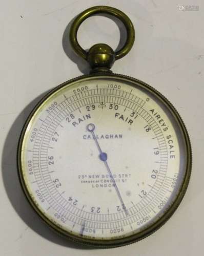 An early 20th century brass cased pocket barometer, the silvered dial inscribed 'Callaghan 23a New