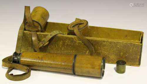 An early 20th century leather bound brass four-draw telescope, unsigned, unextended length 27.8cm,