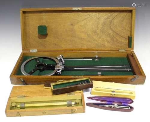 A mid-20th century German Reifler beam compass, cased, and a collection of other scientific