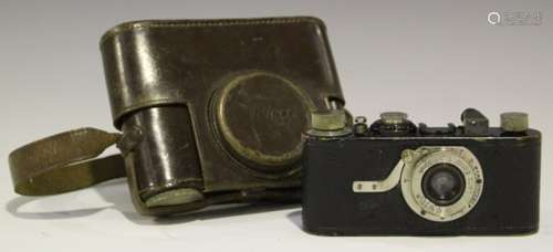 A Leica I camera, No. 44157, circa 1930, with Elmar 1:3.5 f=50mm lens, together with a Leitz