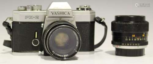 A Yashica FX-2 camera with DSB 50mm 1:1.9 lens, together with a Paragon 1:2.8 f=35mm lens.Buyer’s