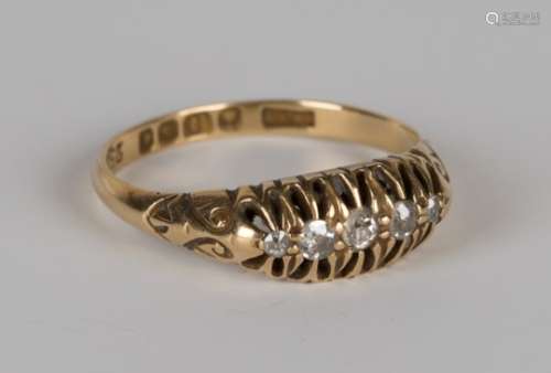 An 18ct gold and diamond five stone ring, mounted with a row of cushion shaped diamonds graduating