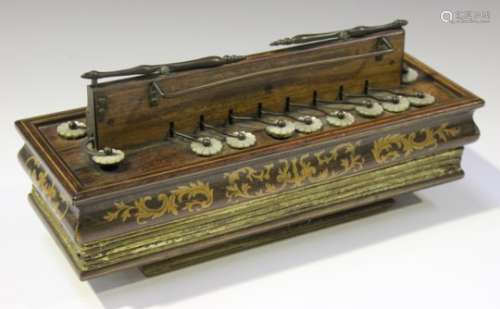 A late 19th century rosewood and foliate inlaid flutina accordion with mother-of-pearl keys and
