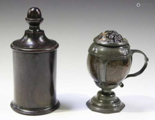 A George III treen cylindrical container with domed lid and acorn finial, height 20cm, together with