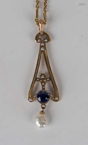 A gold, seed pearl and blue gem set pendant, pierced in an openwork design with a freshwater