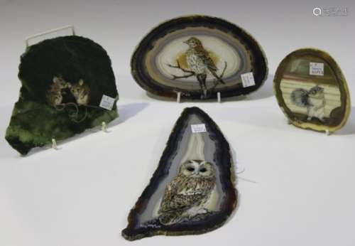 Joan Milne - a group of four polished hardstones, all finely painted with various animals, all