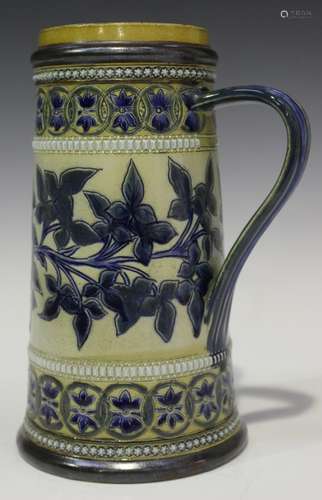 A Doulton Lambeth stoneware jug, circa 1880, decorated by George Tabor, monogrammed, the tapering