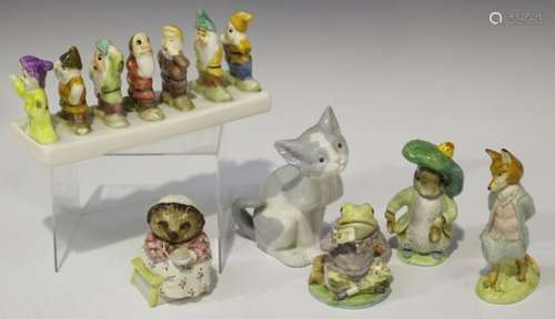 Four Beswick Beatrix Potter figures, comprising Mrs Tiggy Winkle, Jeremy Fisher, Foxy Whiskered