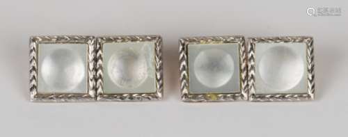 A pair of 9ct gold and mother-of-pearl cufflinks, each front and back of square form, mounted with a