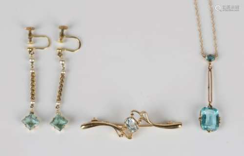 A gold and pale blue gem set pendant necklace, a pair of gold topped imitation pearl and pale blue