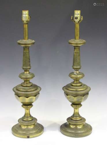 A pair of 20th century cast brass table lamps of faceted knop form, height 67cm.Buyer’s Premium 29.