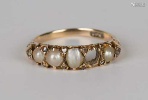 A gold ring, early 20th century, mounted with a row of four graduated half-pearls with pairs of rose