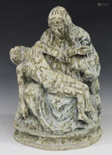 A 20th century Continental carved wooden ecclesiastical figure group of the Pietà, with a white