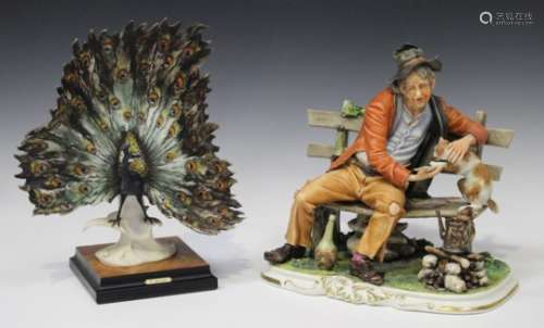 A Capodimonte porcelain figure of a peacock, 20th century, designed by Giuseppe Armani, modelled