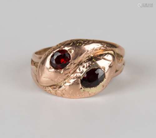 A 9ct gold ring, designed as two entwined snakes, Birmingham 1919, ring size approx W.Buyer’s
