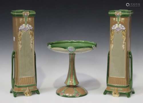 A pair of Secessionist Eichwald majolica vases, early 20th century, each of square section flanked