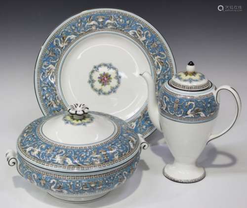 A Wedgwood blue 'Florentine' pattern part service, comprising six dinner plates, four dessert