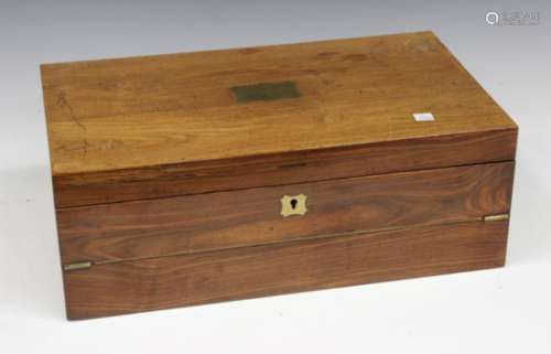 A 19th century rosewood writing slope with brass recessed handles, the hinged lid enclosing a fitted
