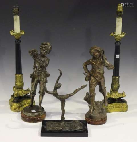 A pair of modern Regency style black and gilt patinated cast metal table lamps, height 50cm,