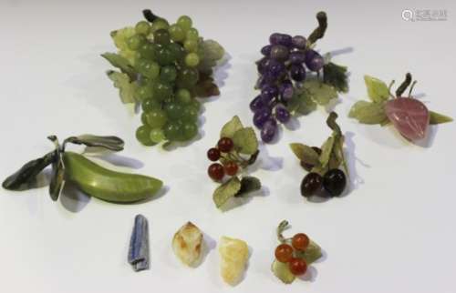 A group of 20th century Chinese carved hardstone models of fruit, including two bunches of grapes