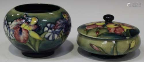 A Moorcroft pottery Orchid pattern vase, 1940s, height 10.5cm, together with a Moorcroft pottery