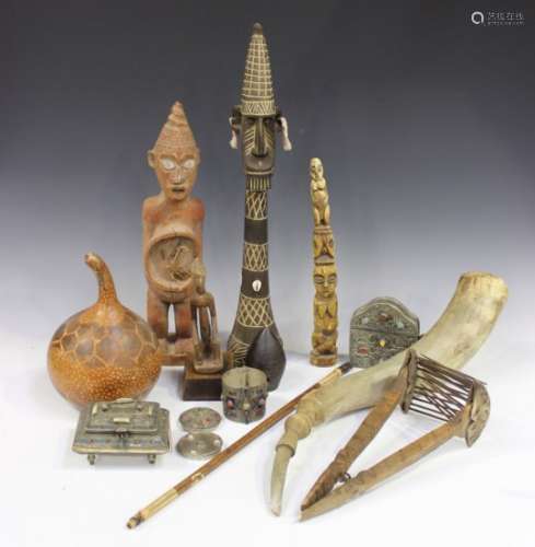 A group of mixed tribal items and Eastern metalware, including three Tibetan plated metal boxes with
