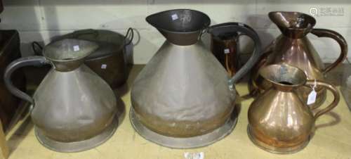 A group of four 19th century copper 'haystack' measures, ranging from four gallons to one gallon,