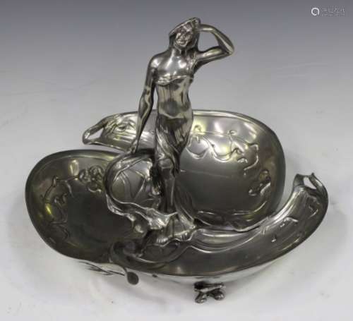 An Art Nouveau Argentor pewter figural centrepiece, the central standing maiden within a triform