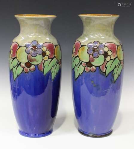 A pair of Royal Doulton stoneware vases, early 20th century, decorated by Winnie Bowstead,