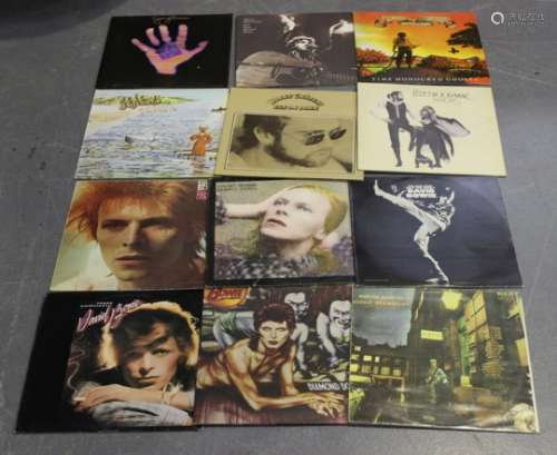 A collection of mainly 1970s LP records, including albums by David Bowie, Steeleye Span and The