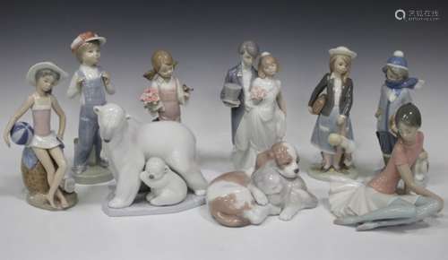 Nine Lladro porcelain figures, including Wedding Bells, No. 5154, Bosom Buddies, No. 6599, Arctic