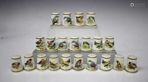 Twenty-one Royal Worcester porcelain thimbles, various dates but each with black printed factory