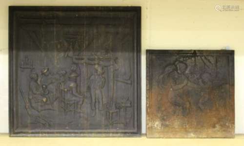 A 20th century cast iron fireback, decorated in relief with an interior fireside scene, 59cm x 59cm,