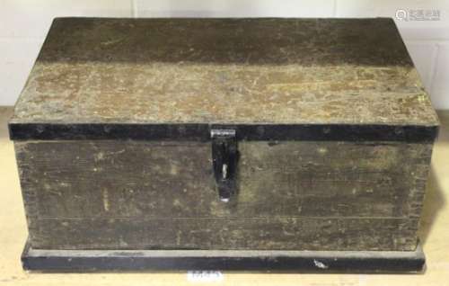 A late 19th/early 20th century iron bound pine tool trunk, enclosing a collection of moulding and