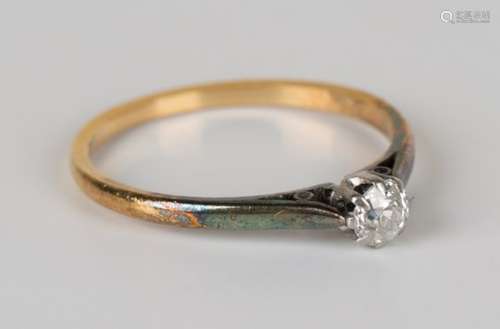 A gold, platinum and diamond single stone ring, claw set with a cushion shaped diamond, detailed '